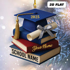 May include: A graduation-themed ornament featuring a blue mortarboard with the year 2025, a gold tassel, and a stack of books. The books are blue and red, with the words "SCHOOL NAME" and "Your Name"