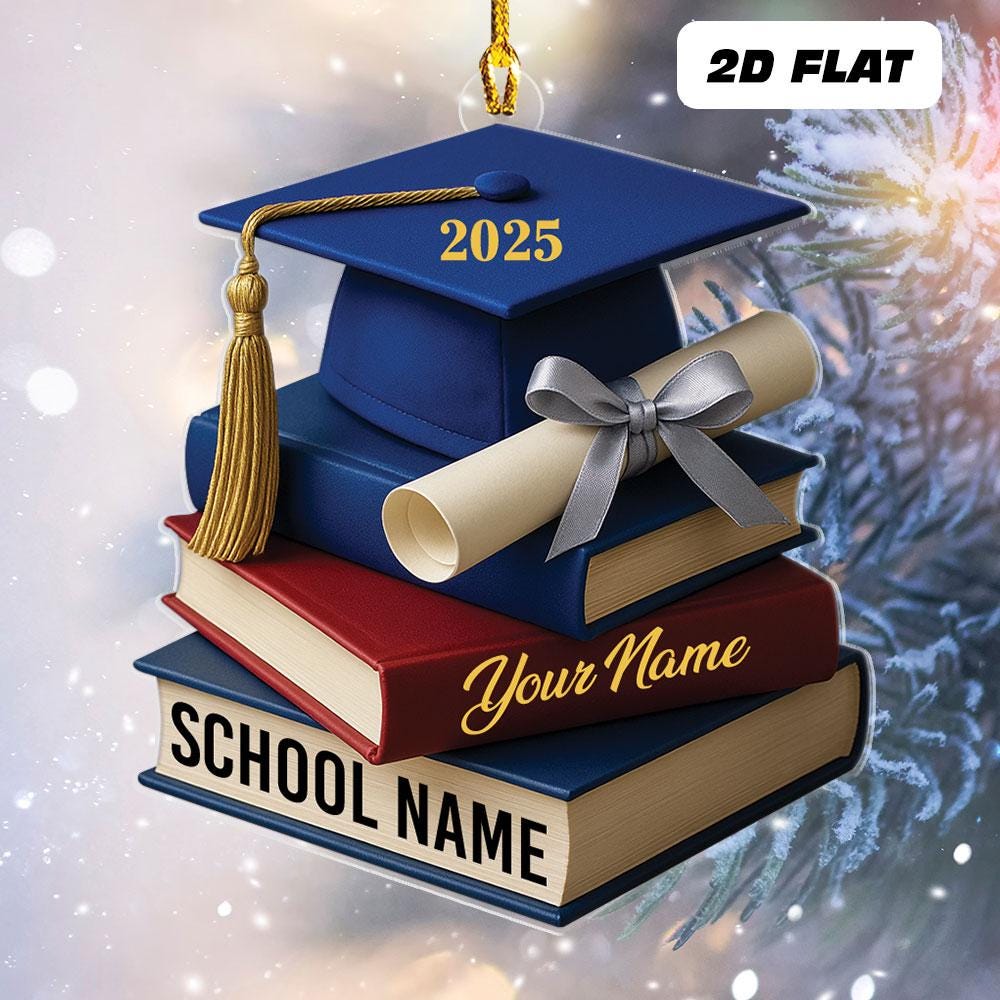 May include: A graduation-themed ornament featuring a blue mortarboard with the year 2025, a gold tassel, and a stack of books. The books are blue and red, with the words "SCHOOL NAME" and "Your Name"