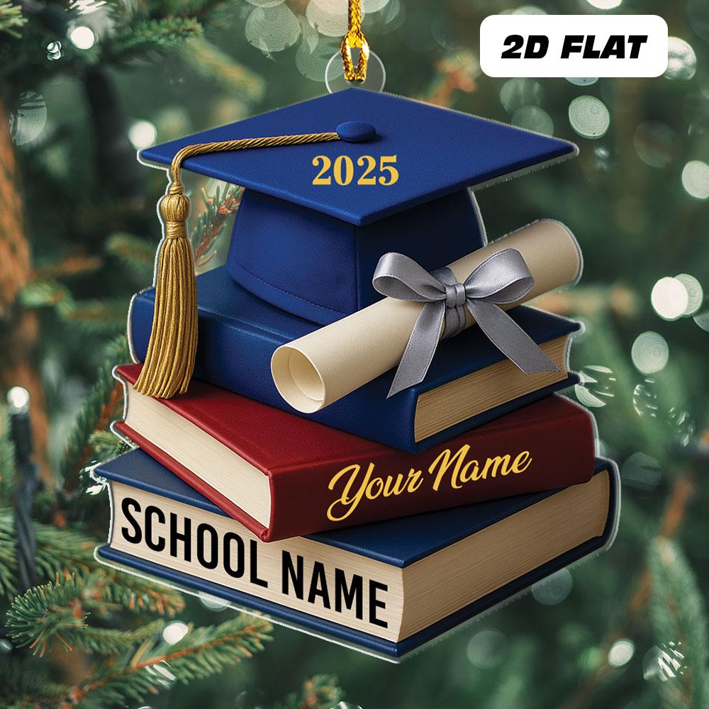 May include: A graduation-themed ornament featuring a blue mortarboard with "2025" in gold, a stack of books, and a diploma tied with a silver ribbon. The bottom book reads "SCHOOL NAME" and "You