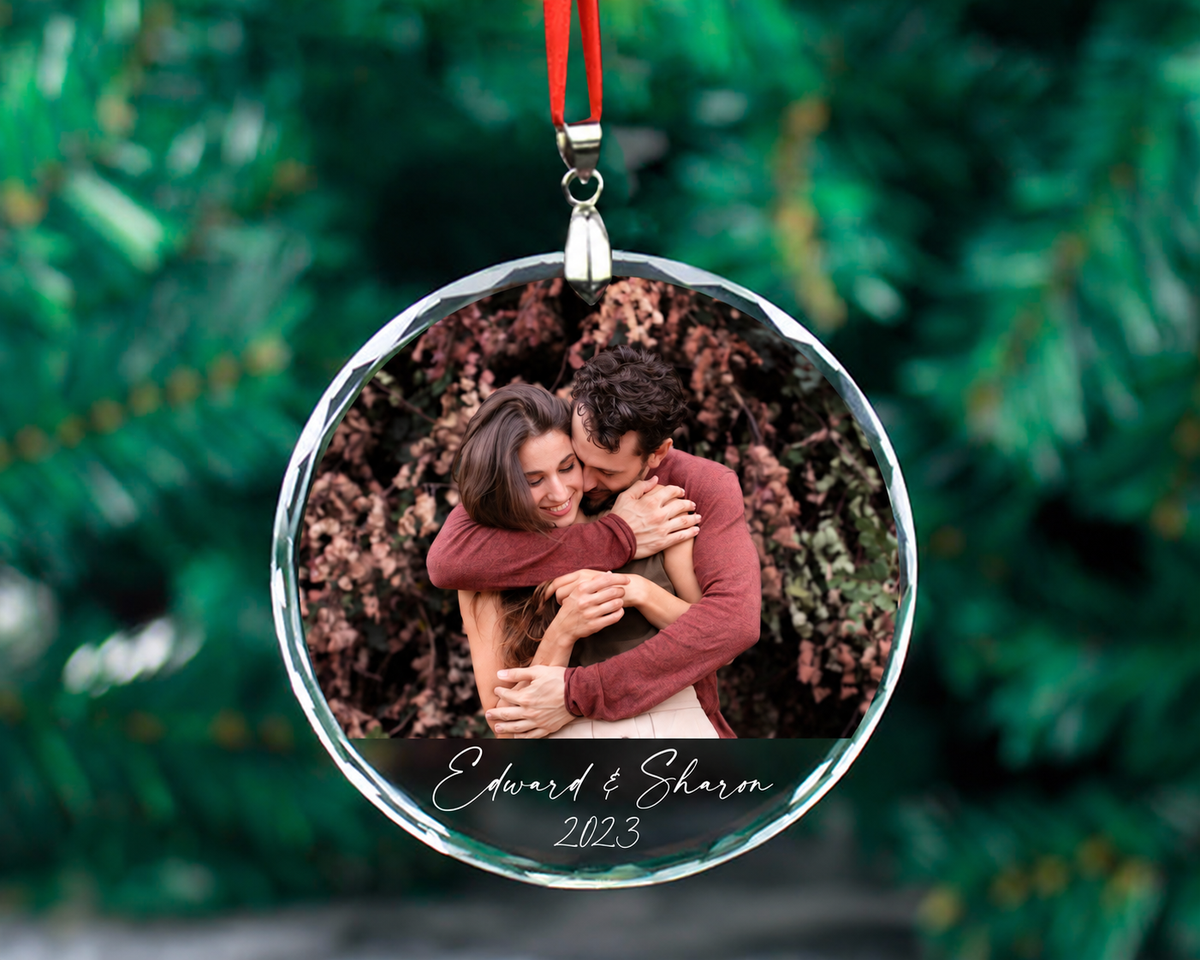 Custom photo and names printed on a round crystal glass ornament